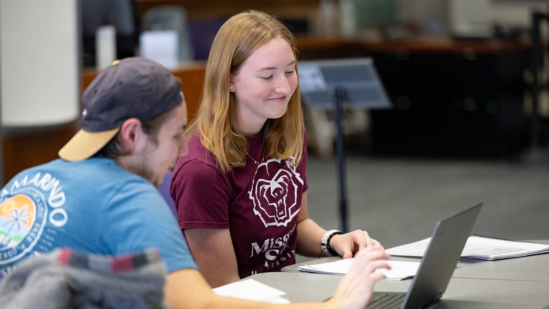 Two students studying together in Meyer Library.